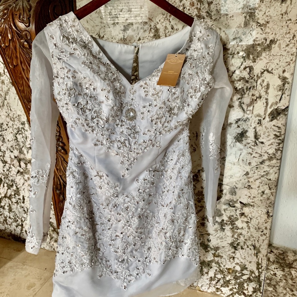 Elegant, hand beaded, quality dress size 4 Never Worn